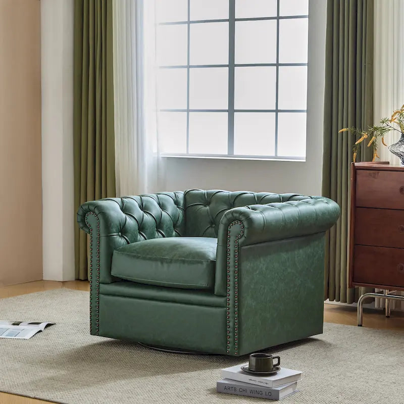 Poltrona Chesterfield girevole con trapuntatura capitonné profonda e rotazione a 360 gradi