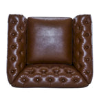 Poltrona Chesterfield girevole con trapuntatura capitonné profonda e rotazione a 360 gradi