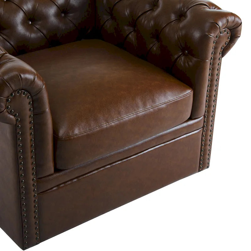 Poltrona Chesterfield girevole con trapuntatura capitonné profonda e rotazione a 360 gradi