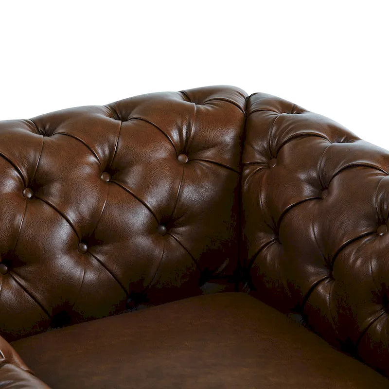 Poltrona Chesterfield girevole con trapuntatura capitonné profonda e rotazione a 360 gradi
