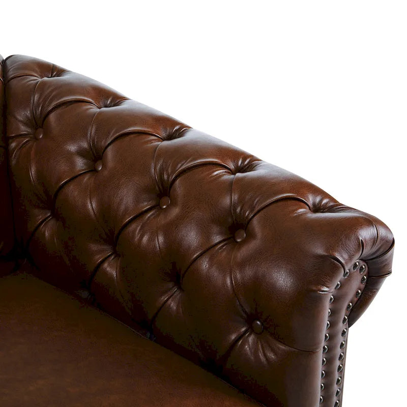 Poltrona Chesterfield girevole con trapuntatura capitonné profonda e rotazione a 360 gradi