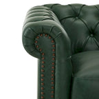 Poltrona Chesterfield girevole con trapuntatura capitonné profonda e rotazione a 360 gradi