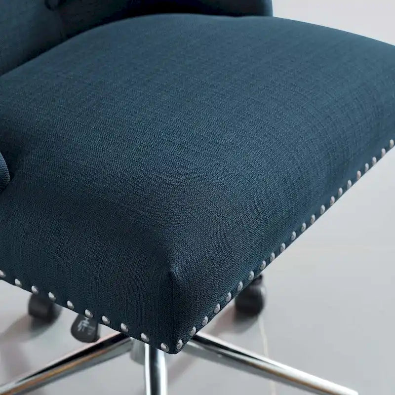 Sedia da ufficio in tessuto imbottita girevole tufted Carson Carrington Lagefors