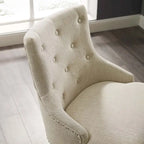Sedia da ufficio in tessuto imbottita girevole tufted Carson Carrington Lagefors