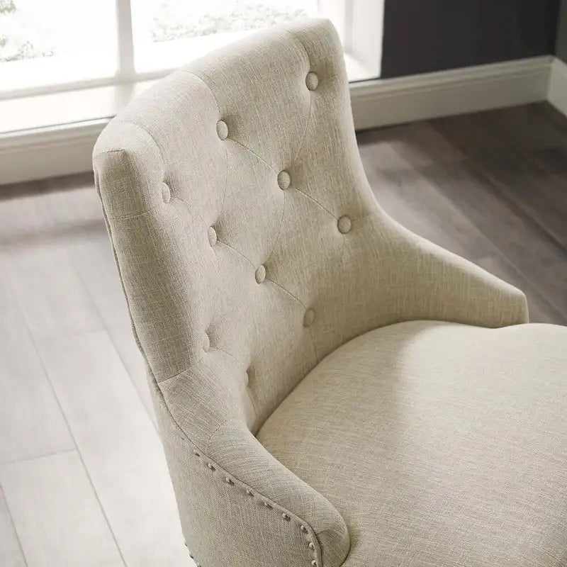 Sedia da ufficio in tessuto imbottita girevole tufted Carson Carrington Lagefors