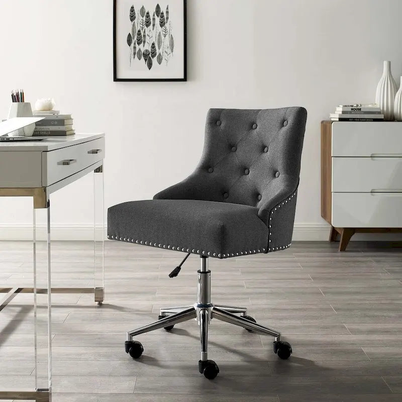 Sedia da ufficio in tessuto imbottita girevole tufted Carson Carrington Lagefors