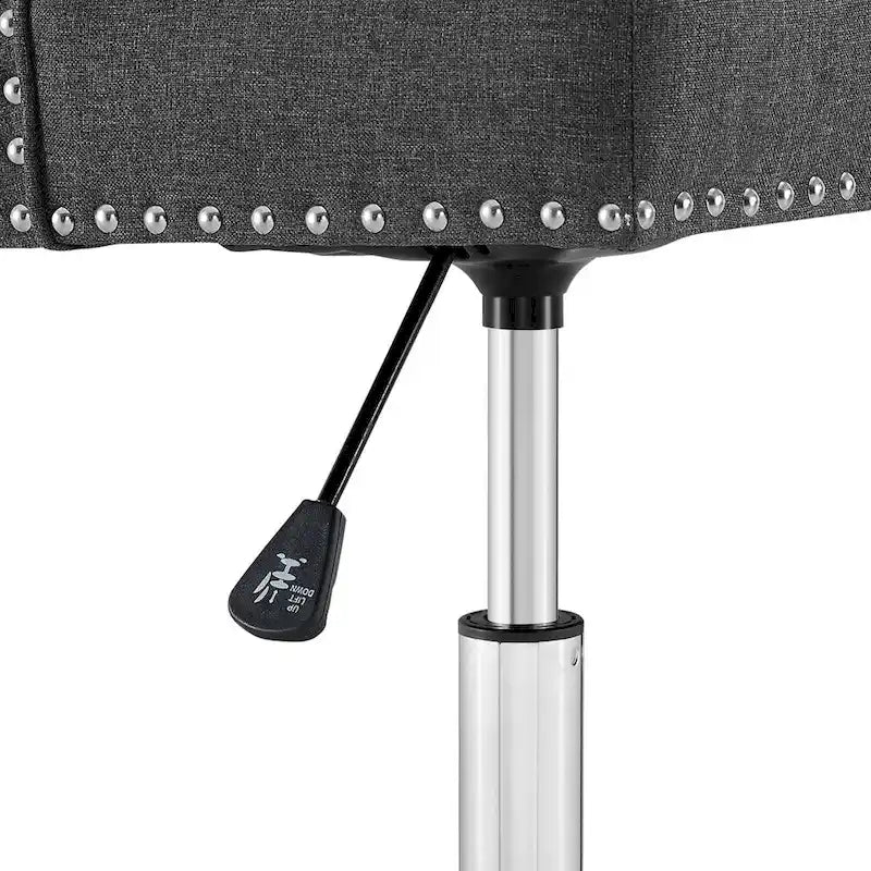 Sedia da ufficio in tessuto imbottita girevole tufted Carson Carrington Lagefors